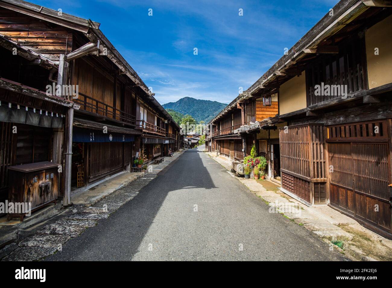 Old Japanese post town of Tsumago. Japanese tourist landmark village. Historic restored village on the Nakasendo trail in the Kiso Valley, Japan. Stock Photo