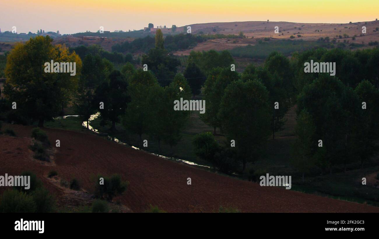 Landscape with trees and a lac Stock Photo - Alamy