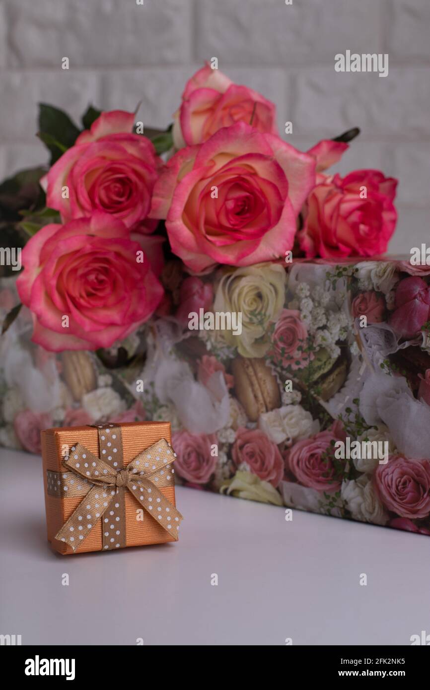 Gift boxes. Bouquet of pink roses. Jewelry box Stock Photo