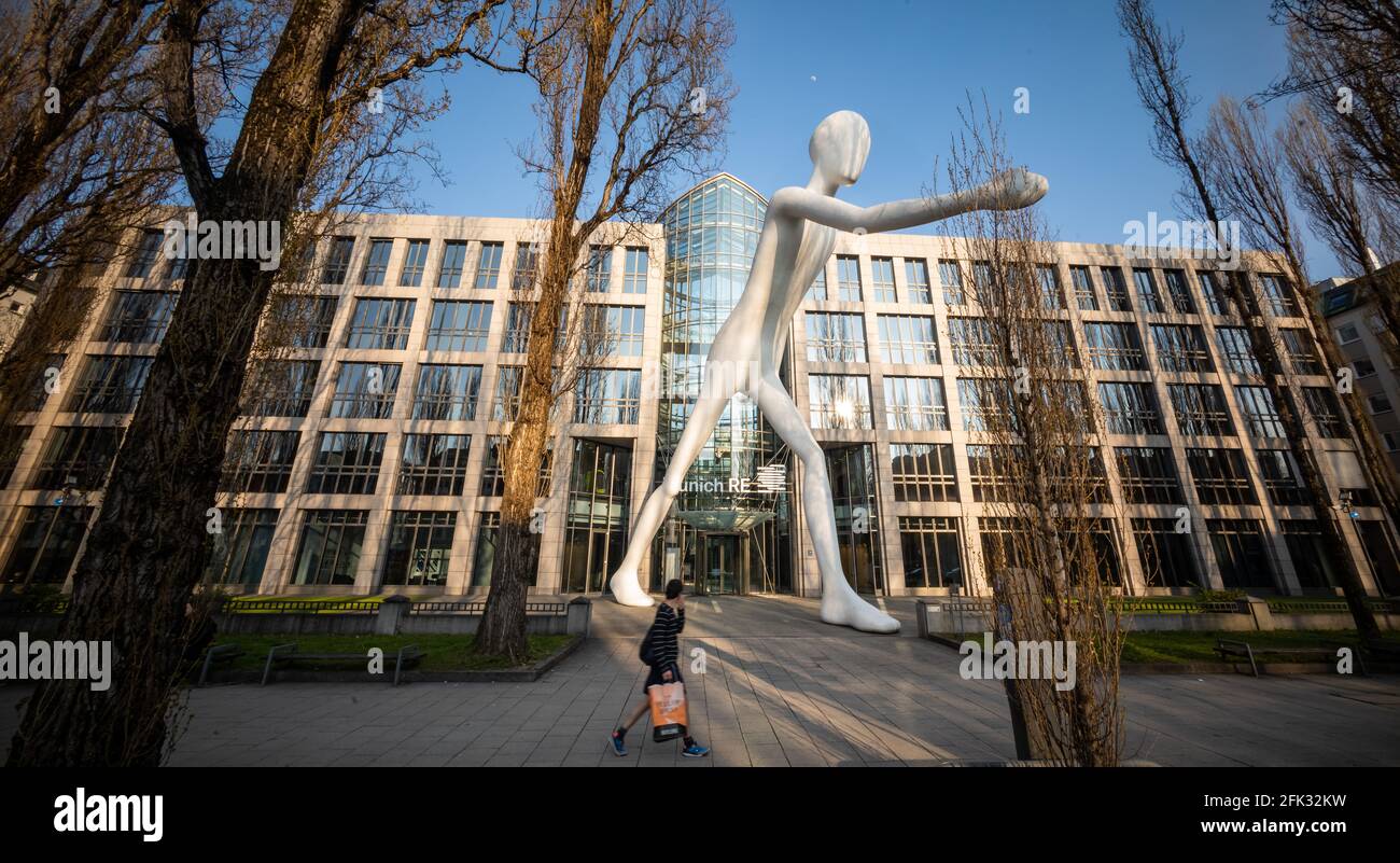 Munich Germany 21st Apr 2021 The Sculpture Walking Man By munich-germany-21st-apr-2021-the-sculpture-walking-man-by