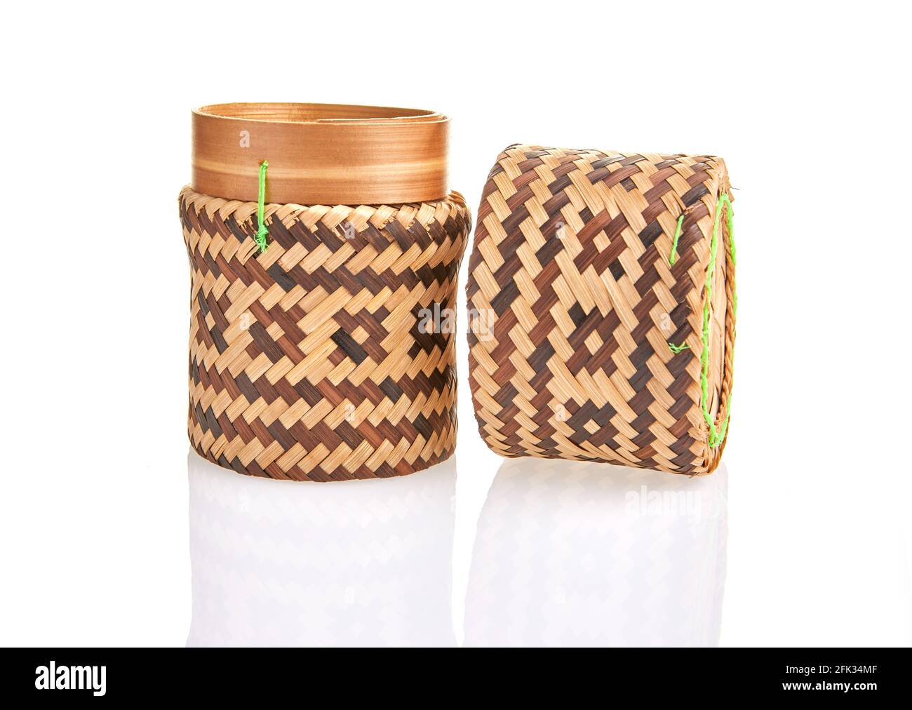 Handmade natural product, round wicker basket, rattan weaving. Eco friendly and sustainable