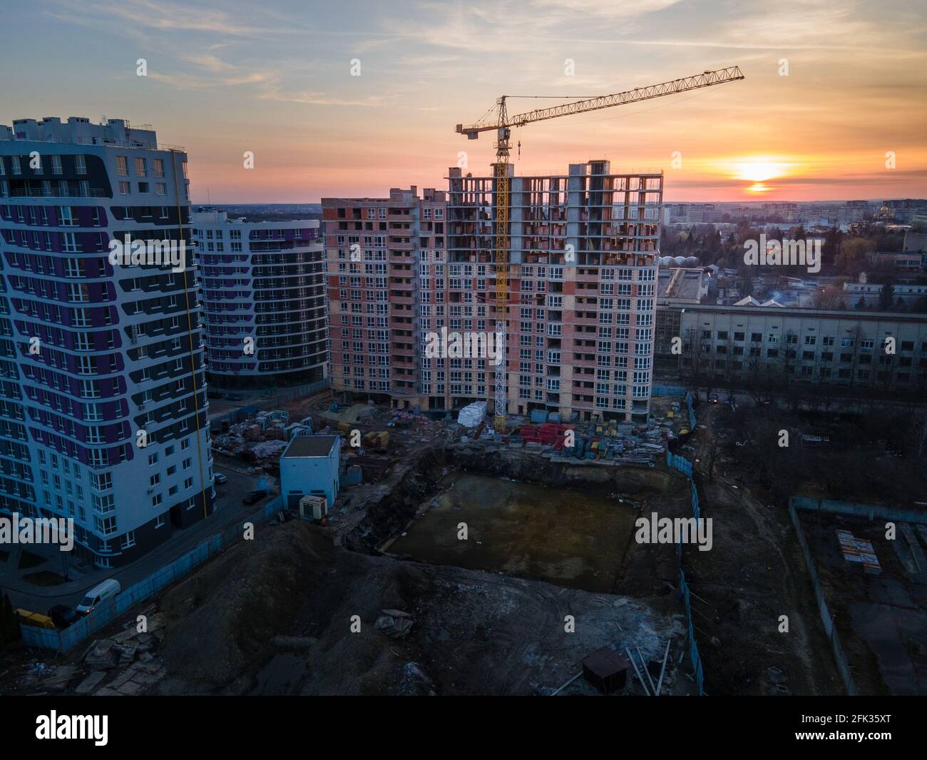 aerial view of apartment construction site with crane Stock Photo - Alamy