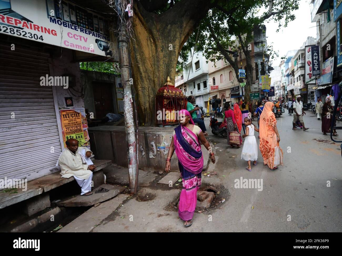 The vibrant narrow streets in the old city of Varanasi, India. Stock Photo