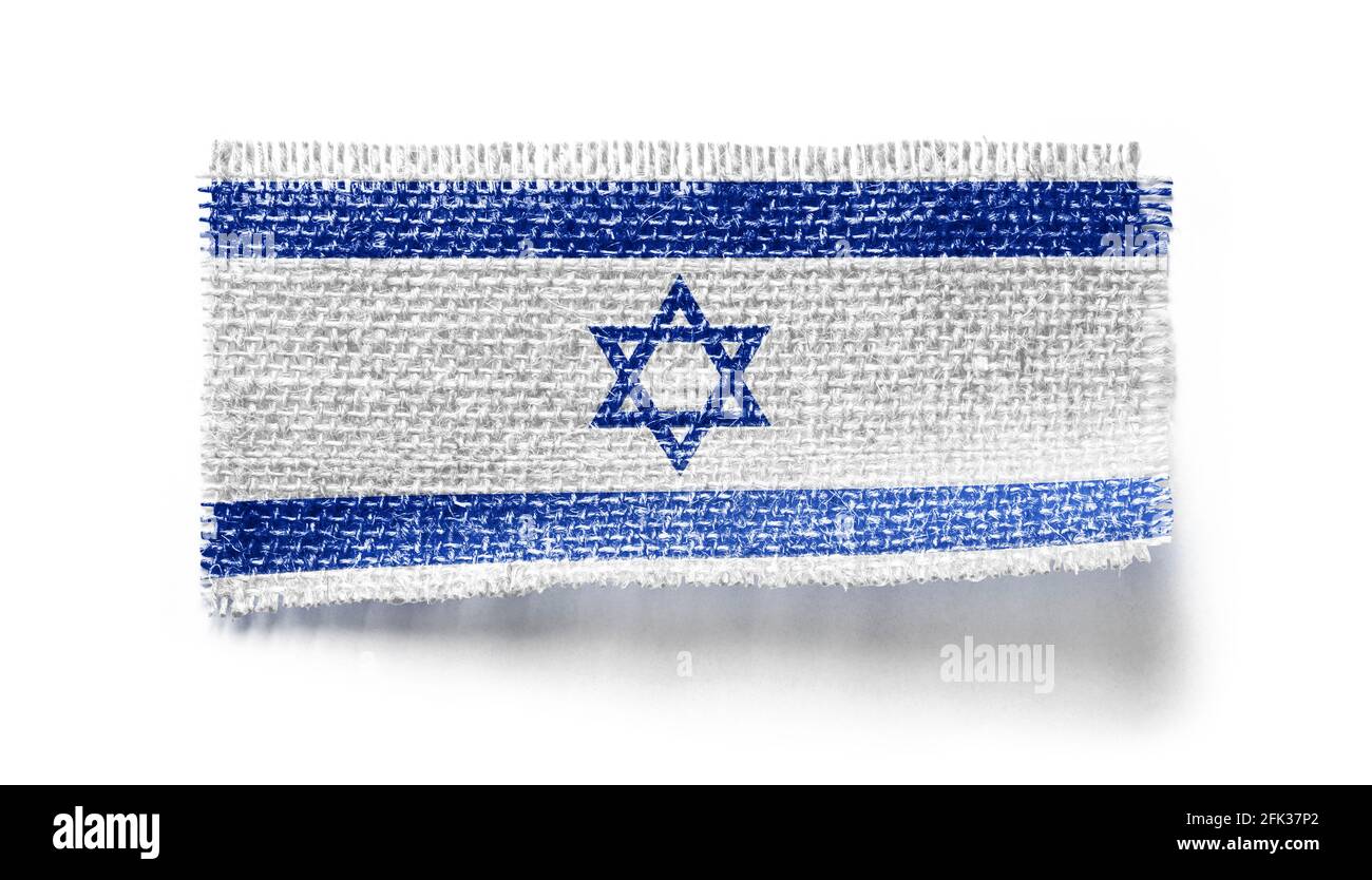 Israel flag on a piece of cloth on a white background Stock Photo - Alamy