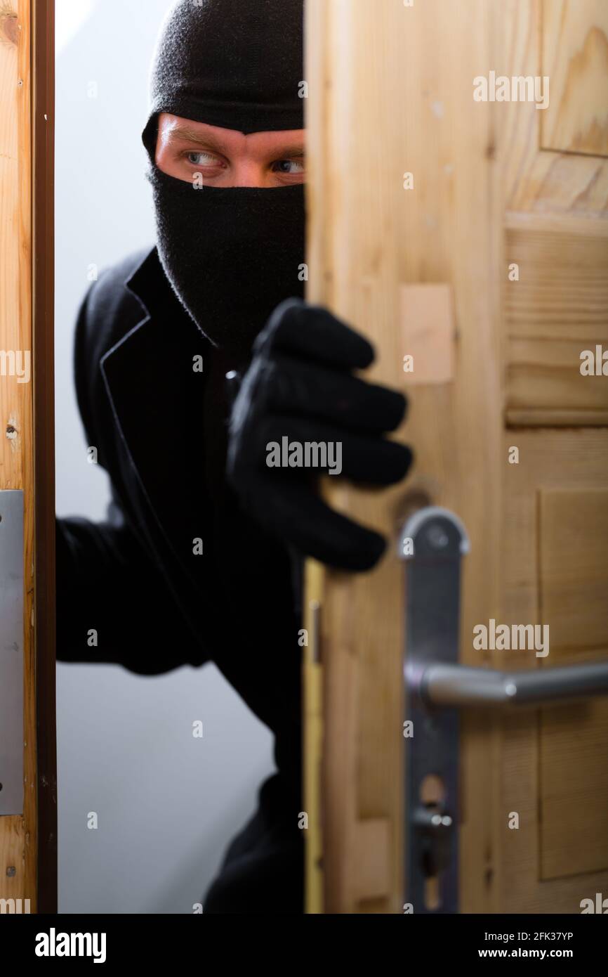 Burglar breaking in hires stock photography and images Alamy