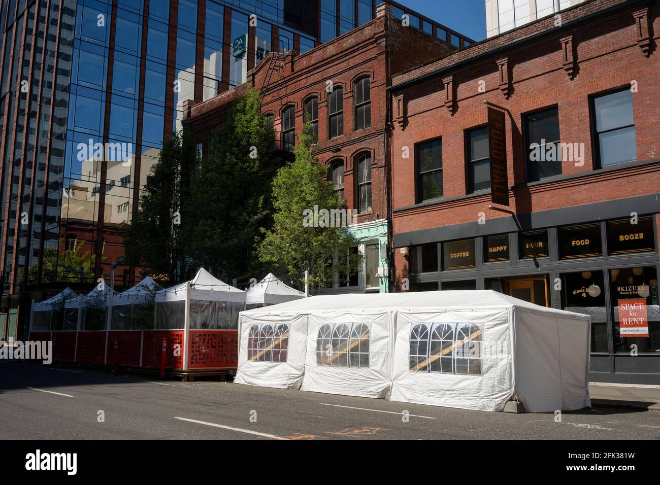 Outdoor dining tents outside of Portland Food Hall and Luc Lac Vietnamese Kitchen in downtown Portland, Oregon, seen on Sunday, April 18, 2021, during... Stock Photo