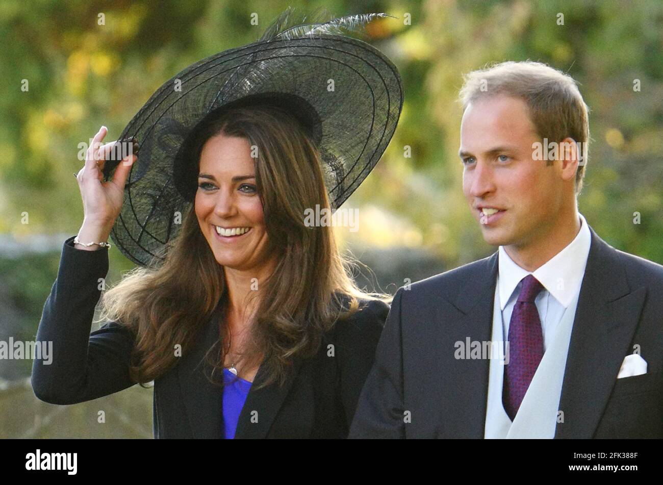 File photo dated 23/10/10 of the Duke and Duchess of Cambridge leaving the wedding of their friends Harry Mead and Rosie Bradford in the village of Northleach, Gloucestershire. University student Kate Middleton first caught the attention of 19-year-old Prince William when she strode down the catwalk in a sheer dress for a charity fashion show. Issue date: Wednesday April 28, 2021. Stock Photo