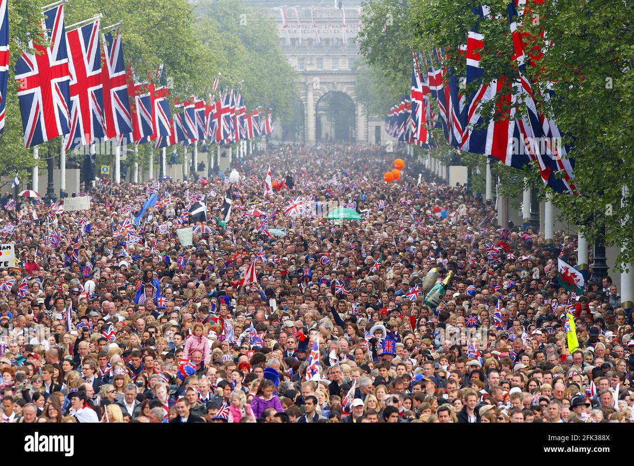 File photo dated 29/04/11 of crowds on the Mall outside Buckingham Palace after the wedding ceremony of Prince William to Kate. The Duchess of Cambridge will have spent a decade as an HRH when she and the Duke of Cambridge mark their 10th wedding anniversary on Thursday. Issue date: Wednesday April 28, 2021. Stock Photo