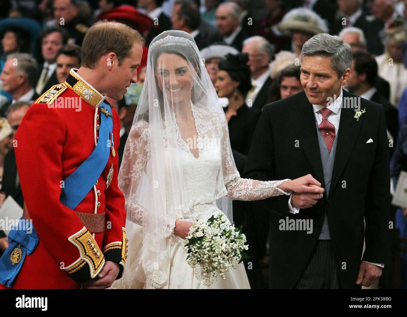File photo dated 29/04/11 of Prince William and Kate Middleton with her father Michael Middleton at Westminster Abbey, London. The Duchess of Cambridge will have spent a decade as an HRH when she and the Duke of Cambridge mark their 10th wedding anniversary on Thursday. Issue date: Wednesday April 28, 2021. Stock Photo