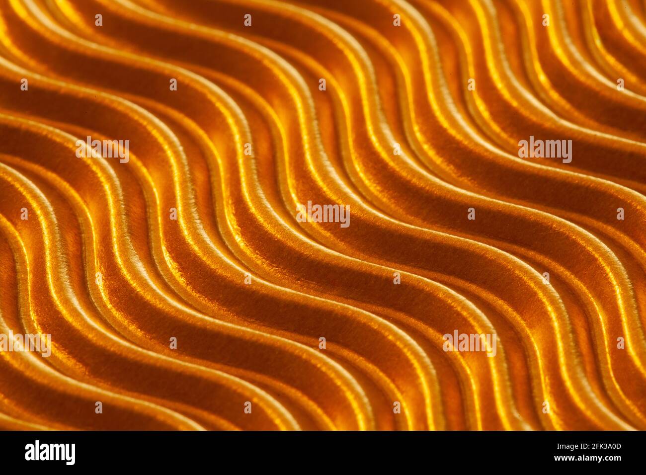 Close-up texture of some gold wavy paper Stock Photo