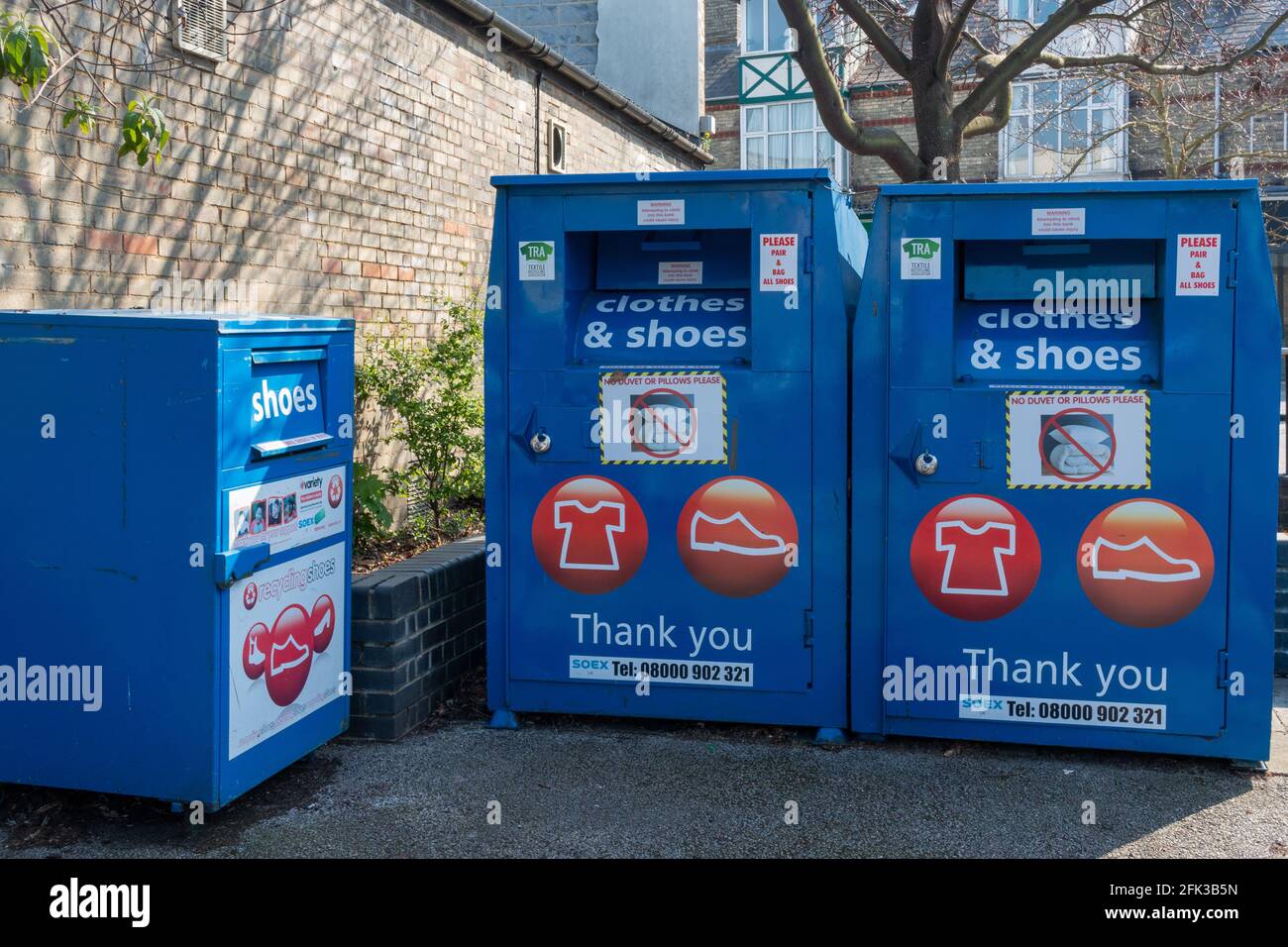 Clothes and shoes recycling bins just off Mill Road, Cambridge, UK