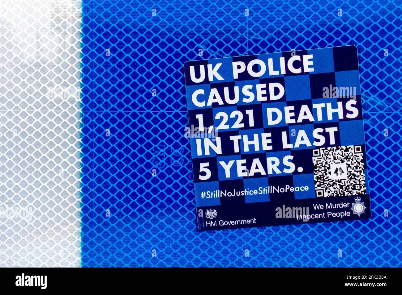 A blue anti-police sticker claiming the UK police caused 1221 deaths in the last five years. Stock Photo