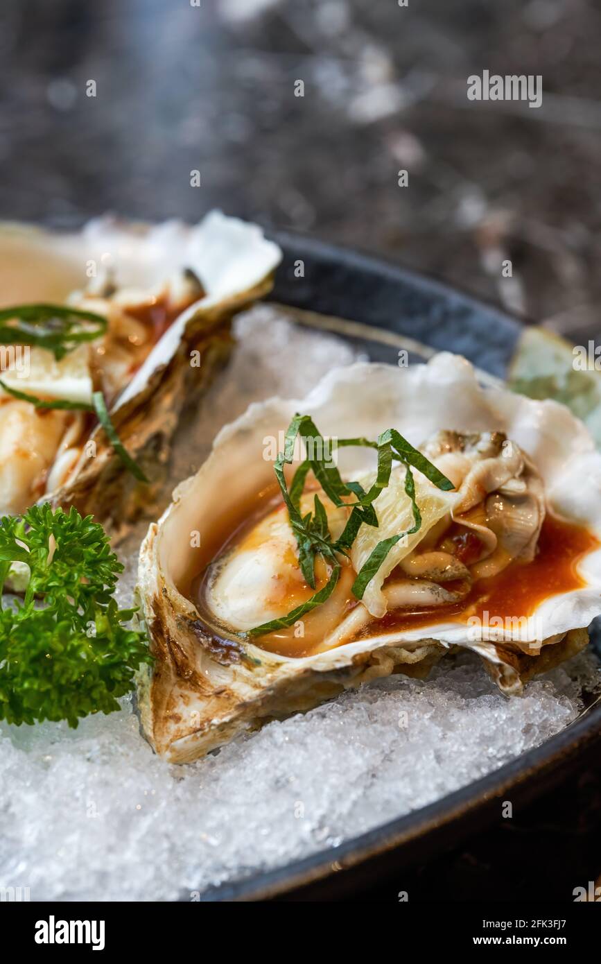 A delicious Japanese dish, oyster sashimi Stock Photo Alamy