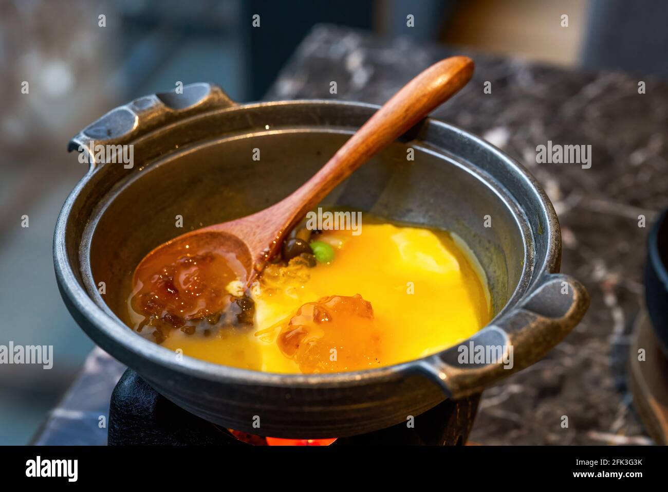 A delicious Japanese dish, steamed eggs with peach gum Stock Photo Alamy