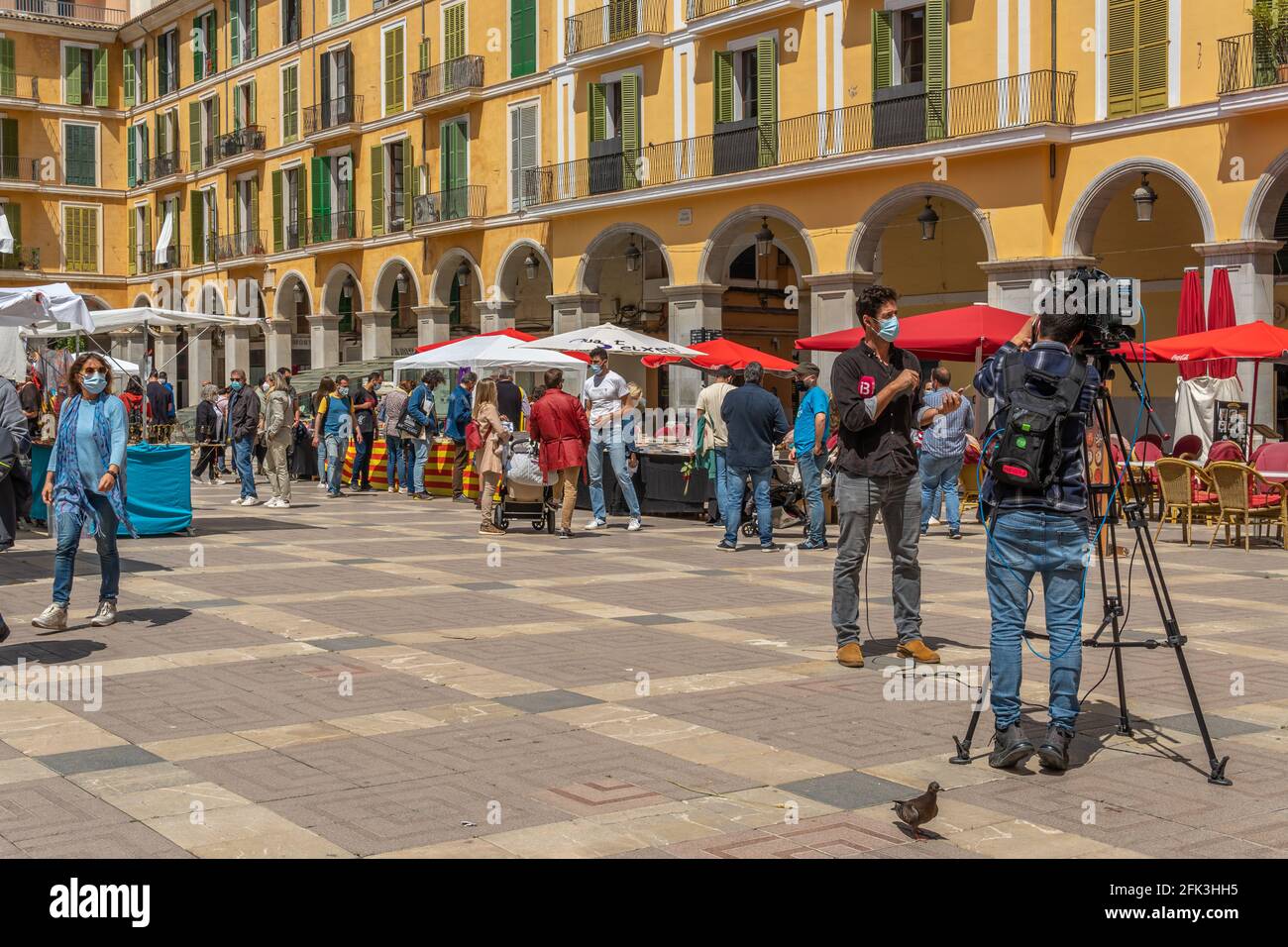 Palma de Mallorca; april 23 2021: Festivity of Sant Jordi or Book Day in the historic center of Palma de Mallorca in times of the Coronavirus pandemic Stock Photo