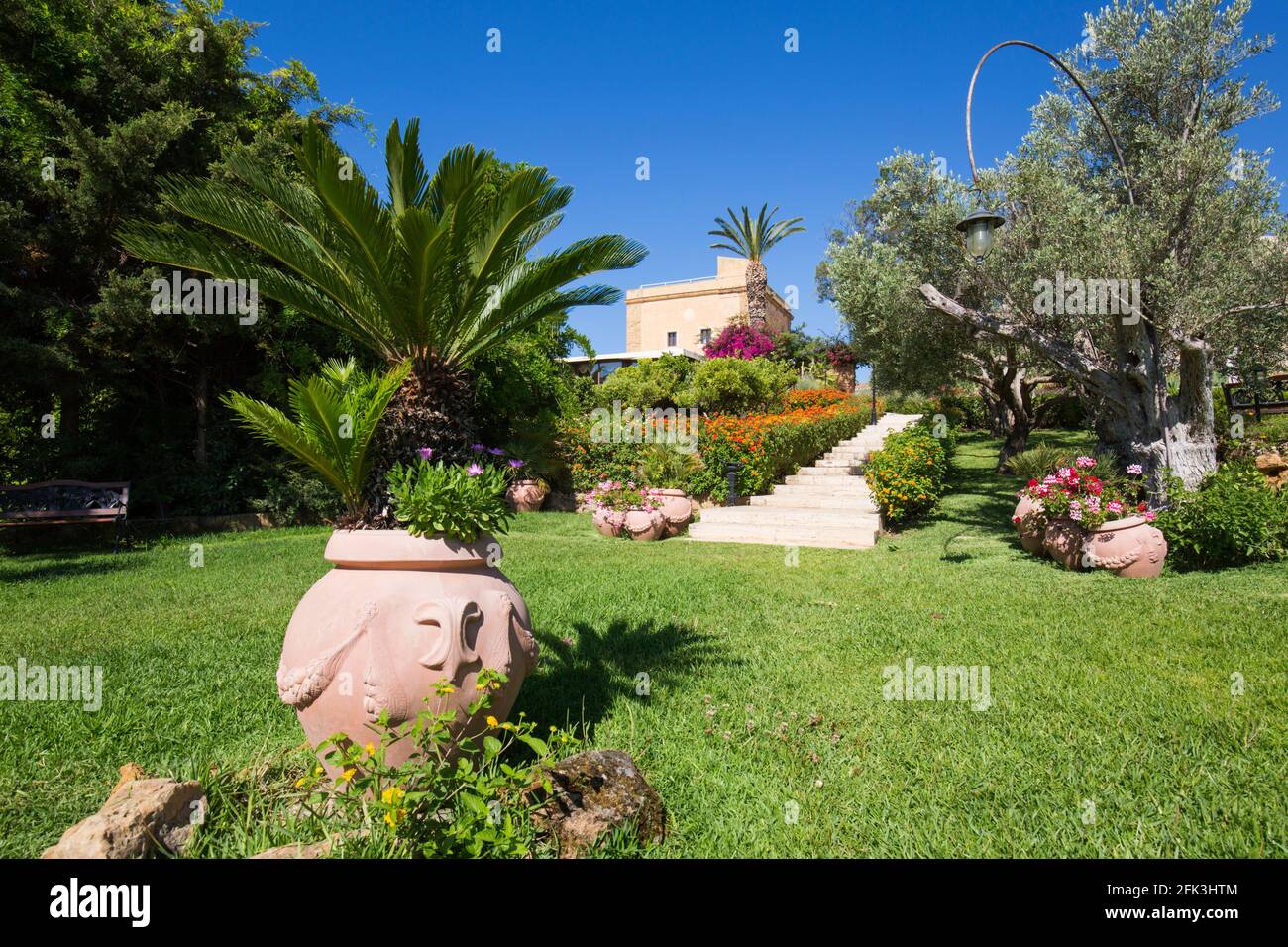 Agrigento, Sicily, Italy. Landscaped gardens of the historic Baglio della Luna boutique hotel. Stock Photo