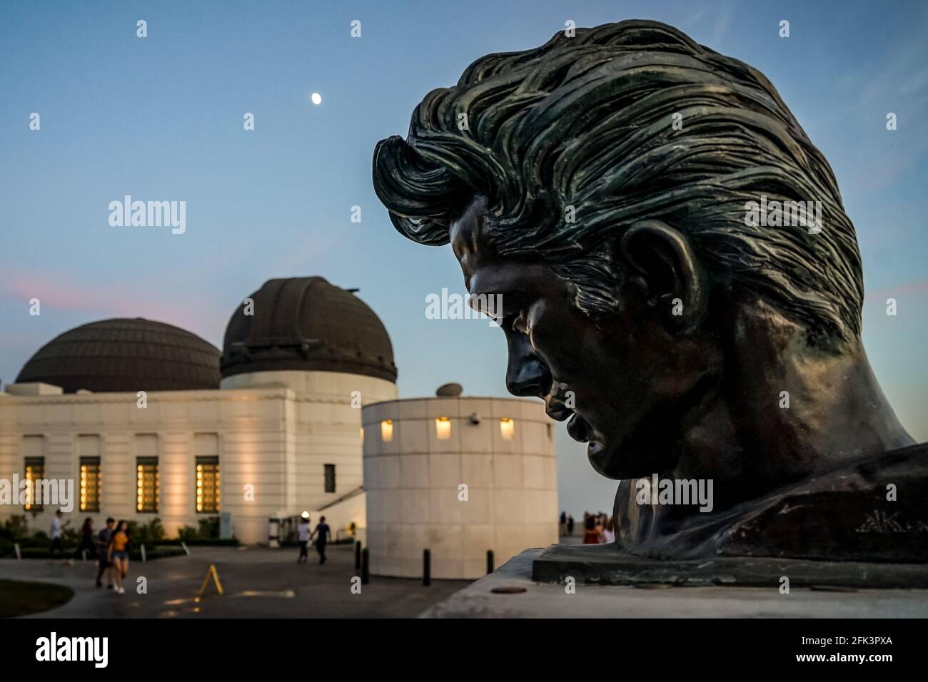 The bust of James Dean at the Griffith Observatory in Los Angeles looking down on the evening