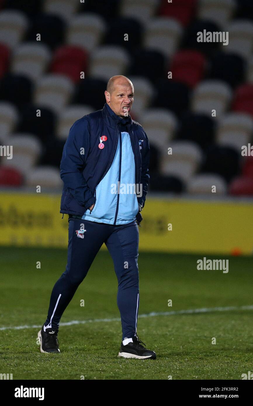 Newport, UK. 27th Apr, 2021. Neil Cox, the manager of Scunthorpe Utd looks dejected at the end of the match. EFL football league two match, Newport county v Scunthorpe Utd at Rodney Parade in Newport, Wales on Tuesday 27th April 2021. this image may only be used for Editorial purposes. Editorial use only, license required for commercial use. No use in betting, games or a single club/league/player publications. pic by Andrew Orchard /Alamy Live news Stock Photo