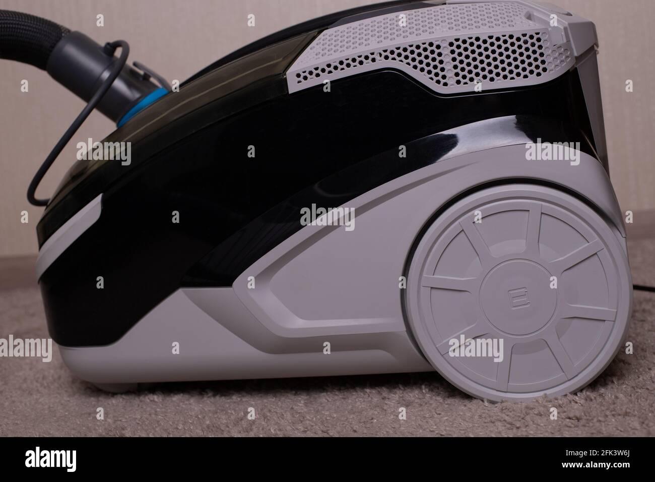 Vacuum cleaner black gray with a carpet cleaner. Washing vacuum cleaner.  Stock Photo