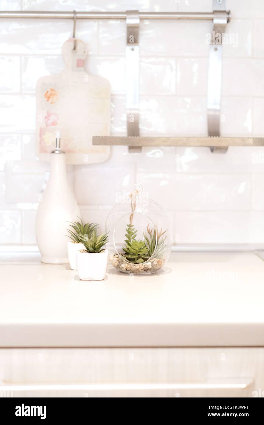 Modern white kitchen at home with kitchenware Stock Photo
