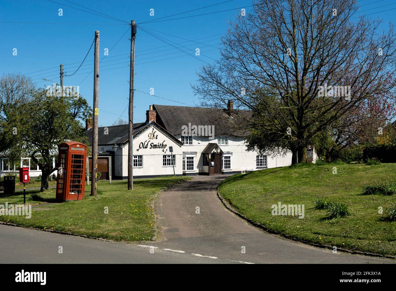 Church Lawford village in spring including The Old Smithy pub, Warwickshire, England, UK Stock