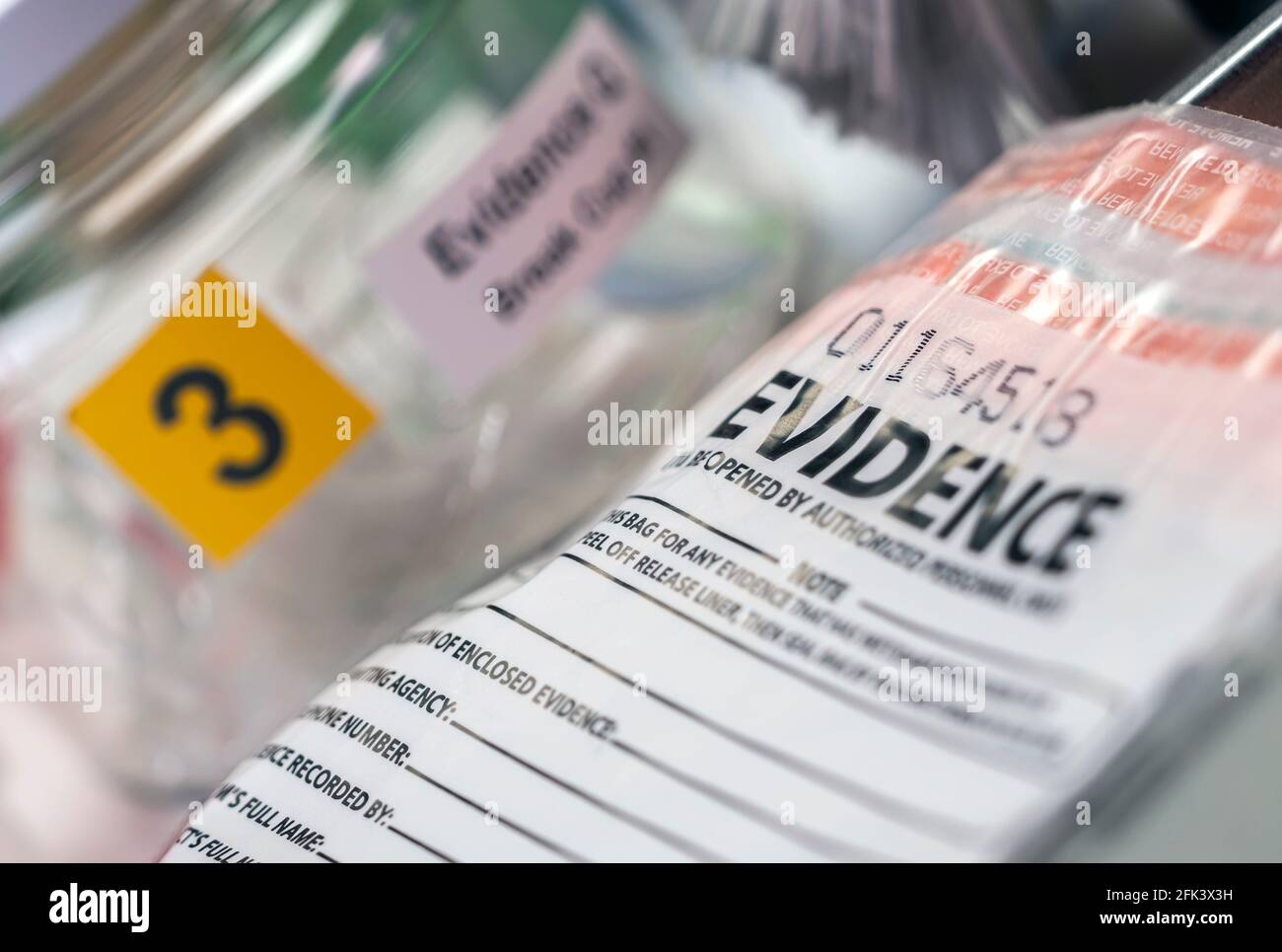 Detail of DNA sampling tubes in Laboratorio forensic equipment, conceptual image Stock Photo
