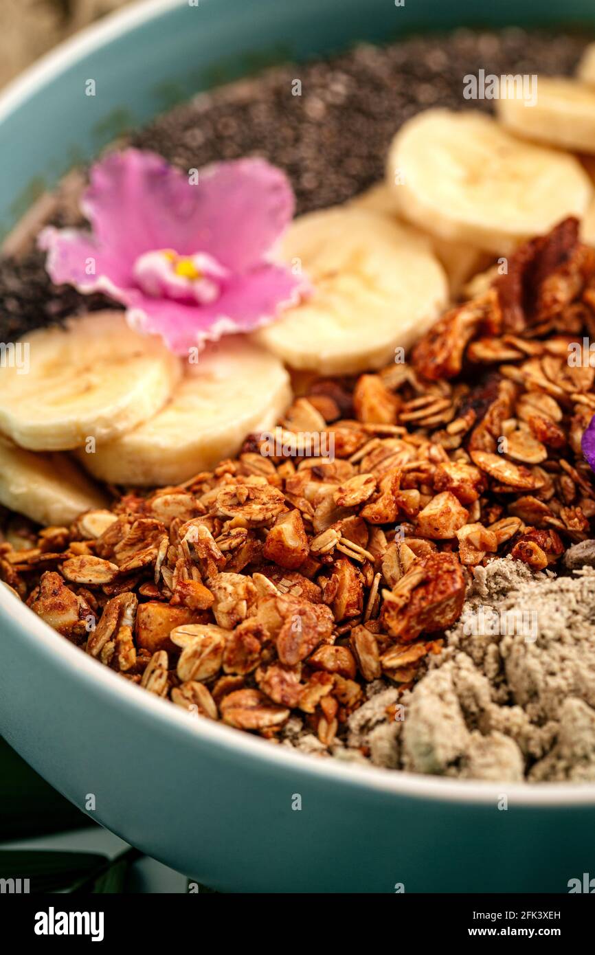 Smoothie bowl with halva bananas seeds and granola Stock Photo Alamy
