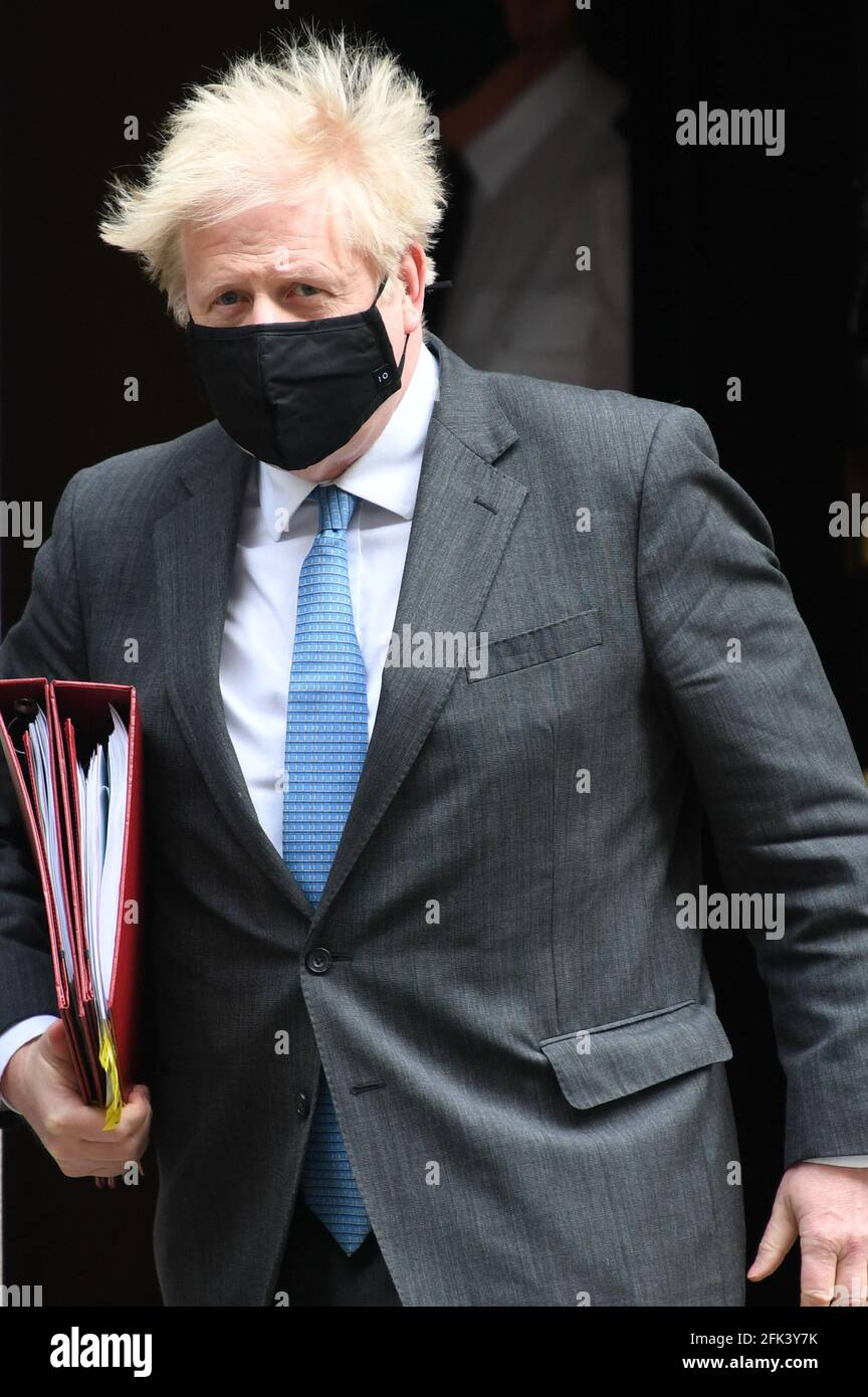 Prime Minister Boris Johnson leaves 10 Downing Street to attend Prime Minister's Questions at the Houses of Parliament, London. Picture date: Wednesday April 28, 2021. Stock Photo