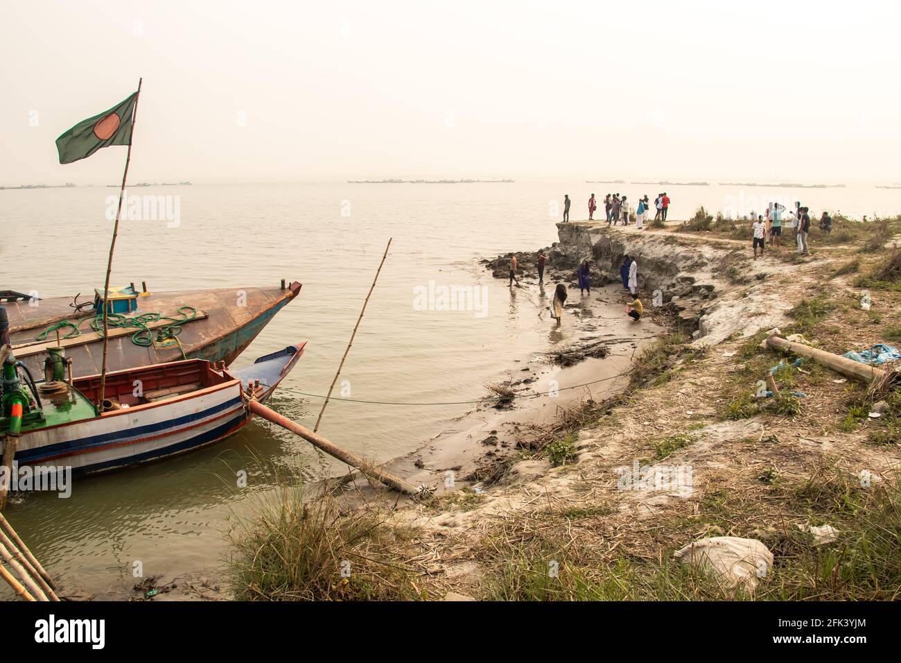 Massive erosion of the riverbank. I captured this image on 12-02-2021 from Bangladesh, South Asia Stock Photo
