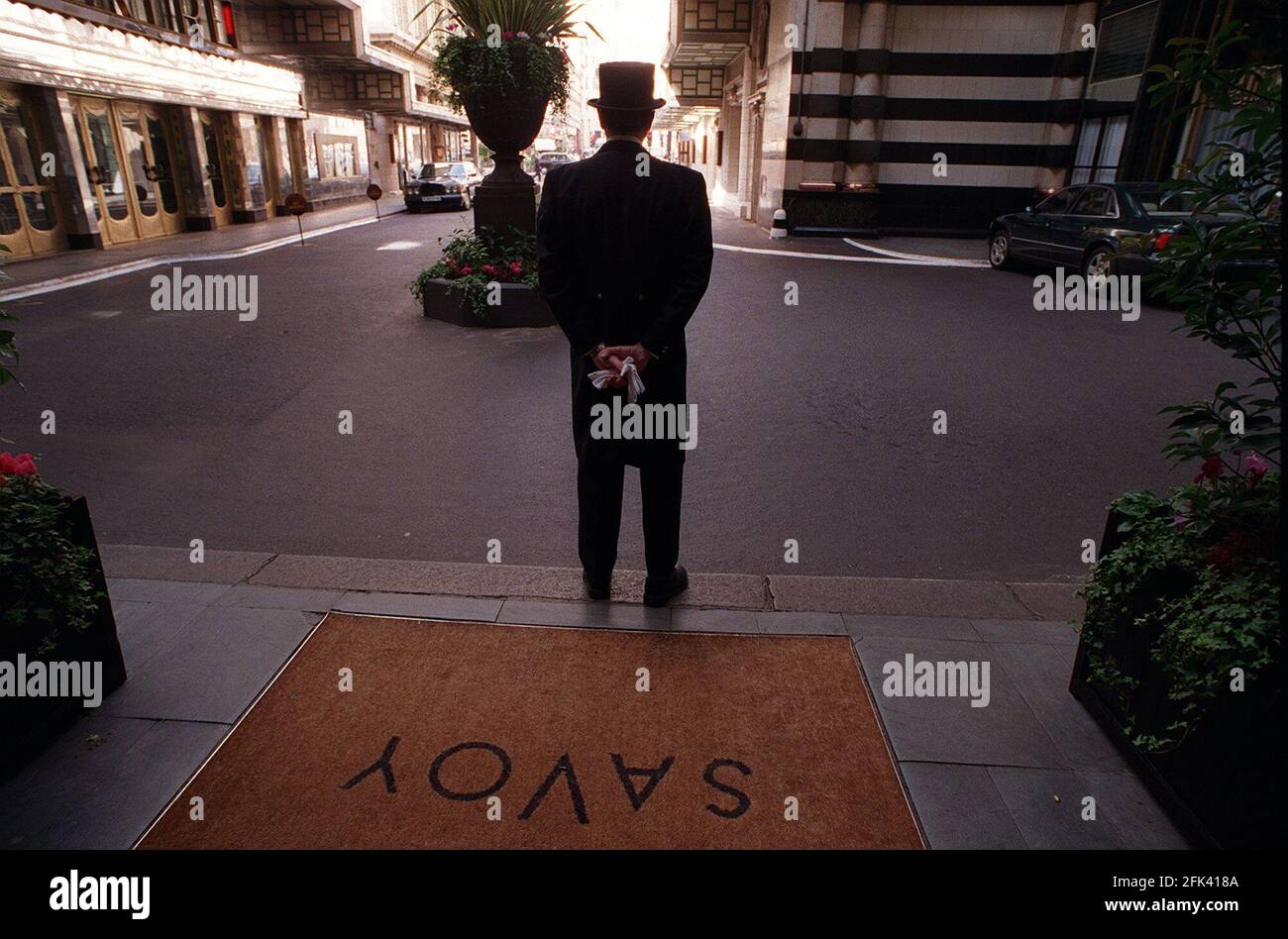 Hotel savoy doorman hires stock photography and images Alamy
