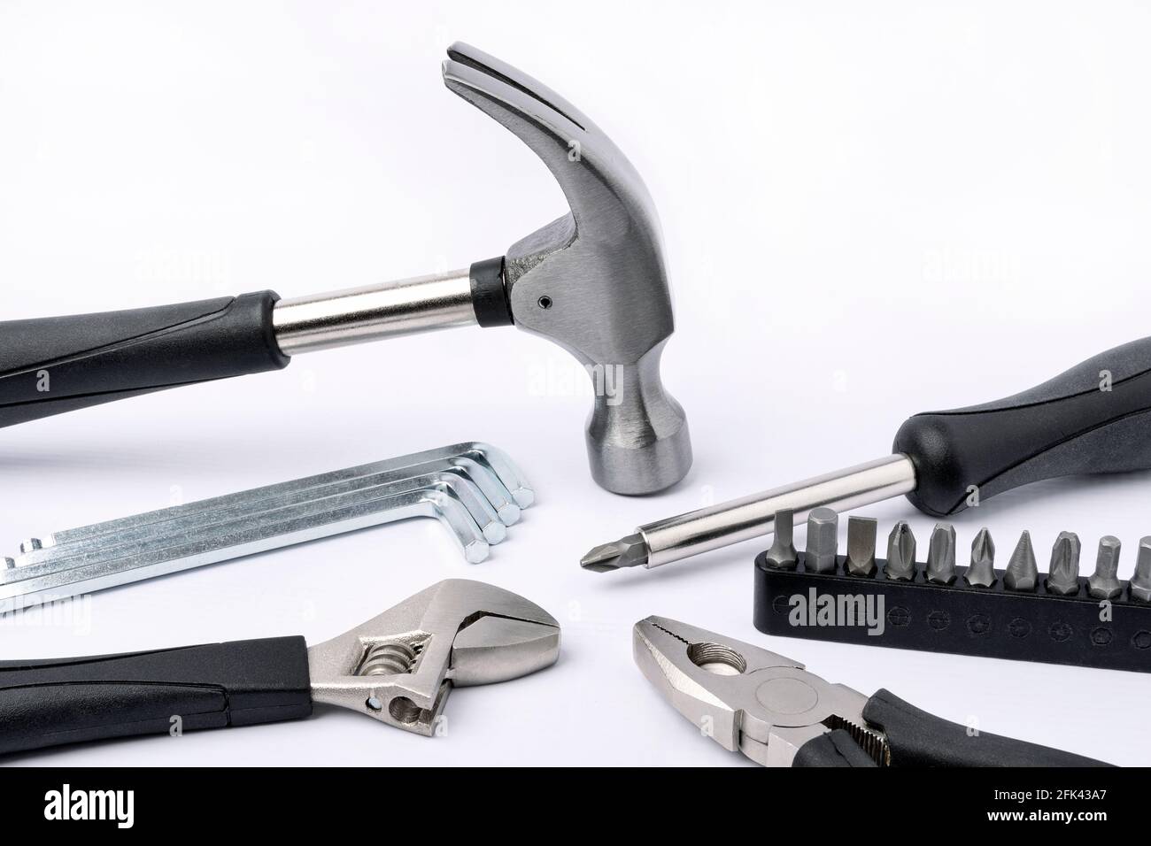 Set of metal working tools on white background. Stock Photo