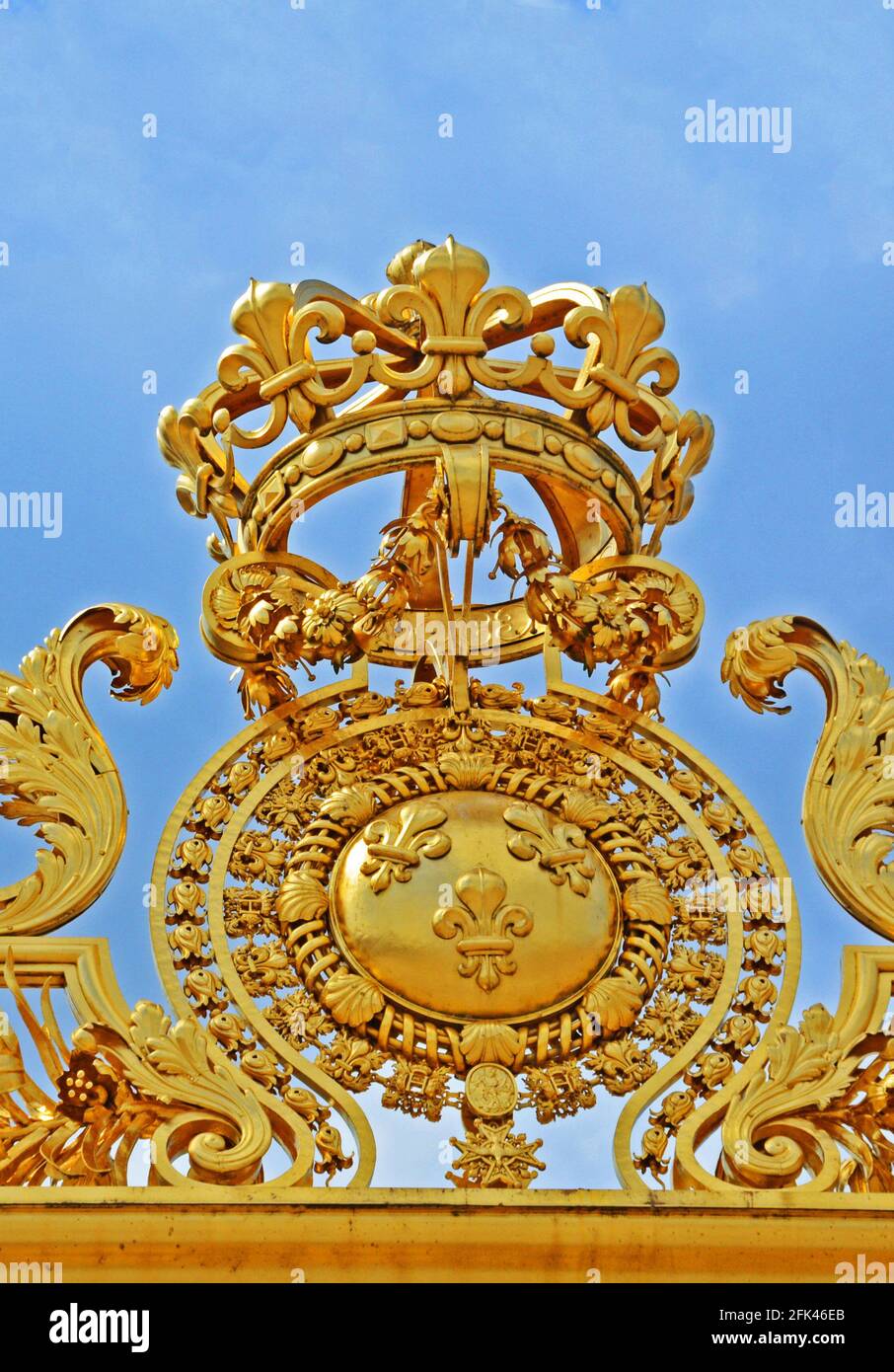 Close-Up of Gold Colored Metallic Gate of Versailles castle, Yvelines, Ile-de-France, France Stock Photo