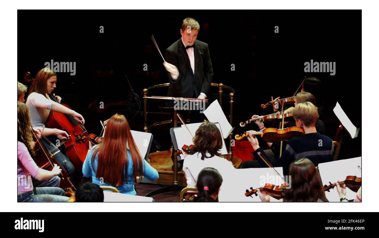 30 th Anniversary Schools Prom 2004.... Mathew Ryan aged 14  from Bolton picks up his Baton as the youngest ever conductor of Land of Hope and Glory.pic David Sandison 8/11/2004 Stock Photo