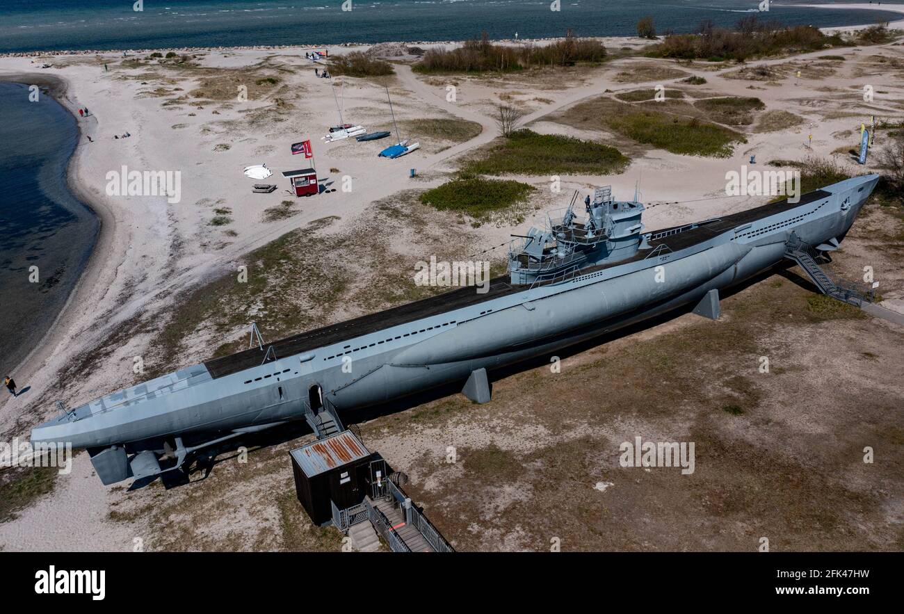 Laboe, Germany. 28th Apr, 2021. Like a beached whale, the museum submarine  U995 lies in the sun on the beach of Laboe (aerial view with a drone).  Credit: Axel Heimken/dpa/Alamy Live News