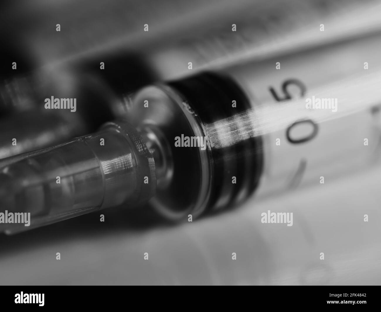 Several syringe on white table prepared for injection in hospital, selective focus, DOF, macro Stock Photo