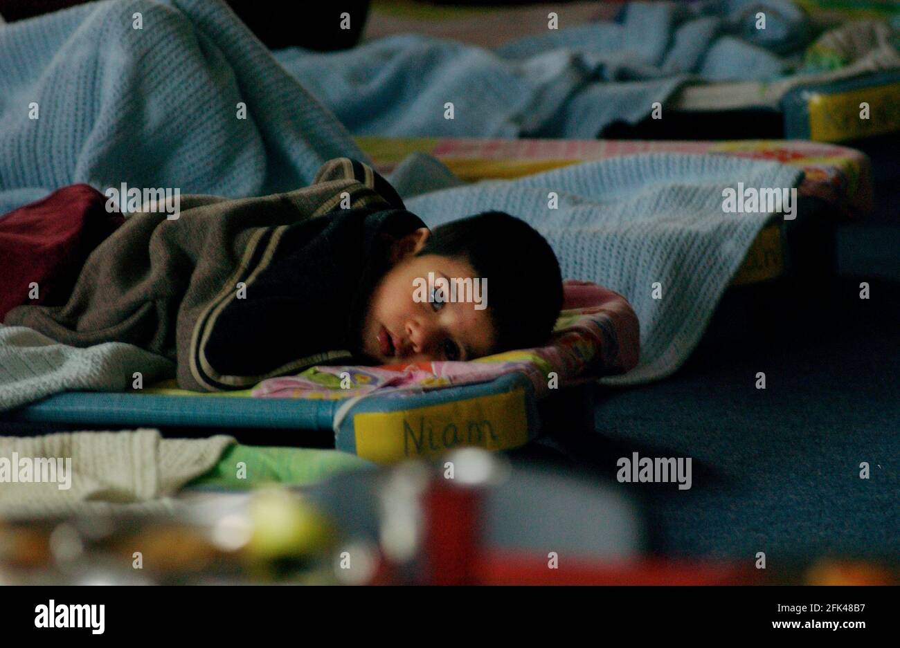 CHILDREN SLEEPING AT MIDDAY IN THE PRESCHOOL AT THE SWAMINARAYAN INDEPENDENT DAY SCHOOL IN NEASDEN. 2 February 2005 Stock Photo