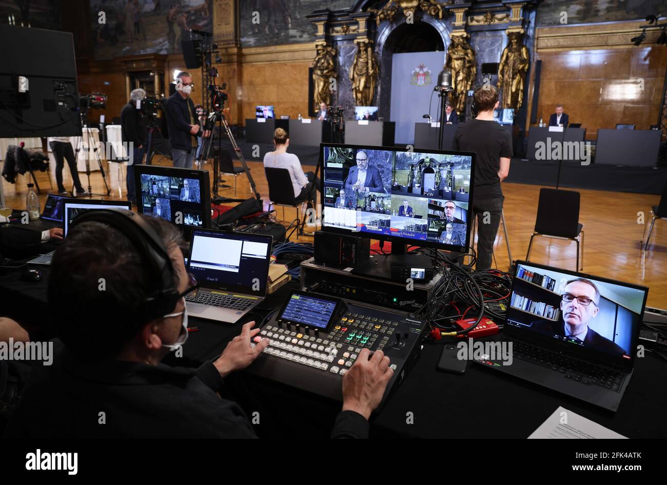 Hamburg, Germany. 28th Apr, 2021. A technician works at his video mixer  during the presentation of a study on the news competence of adolescents  and young adults in the digital media world.