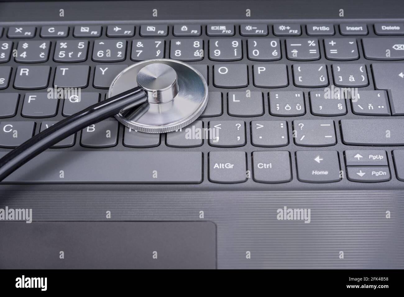 Stethoscope on a computer keyboard Stock Photo - Alamy