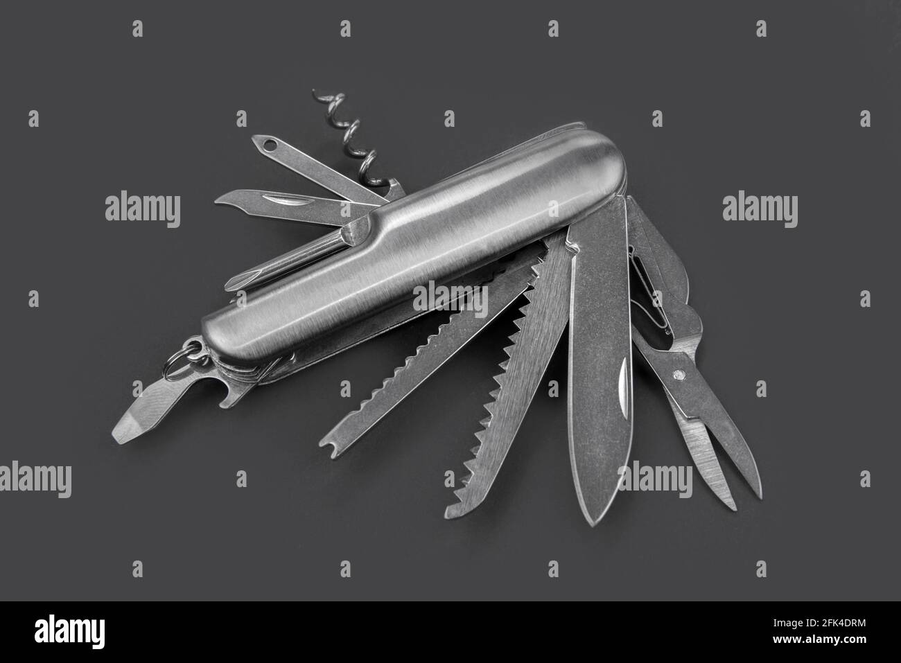 Swiss many task army knife. Multi tool pocket knife. Stock Photo