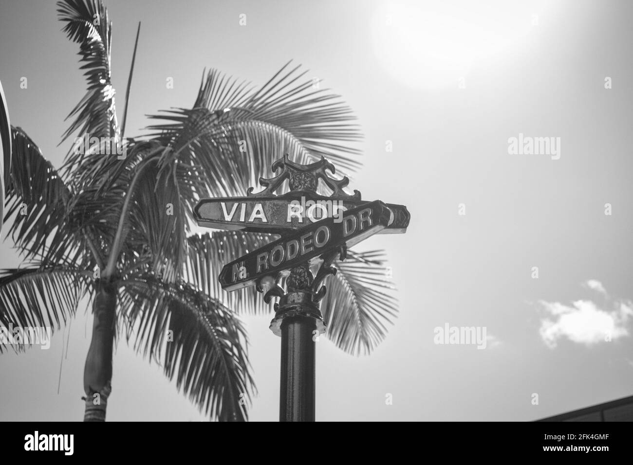 LOS ANGELES, UNITED STATES - Oct 28, 2013: Los Angeles, United States,  October 2018: Via Rodeo drive street sign in black and white Stock Photo