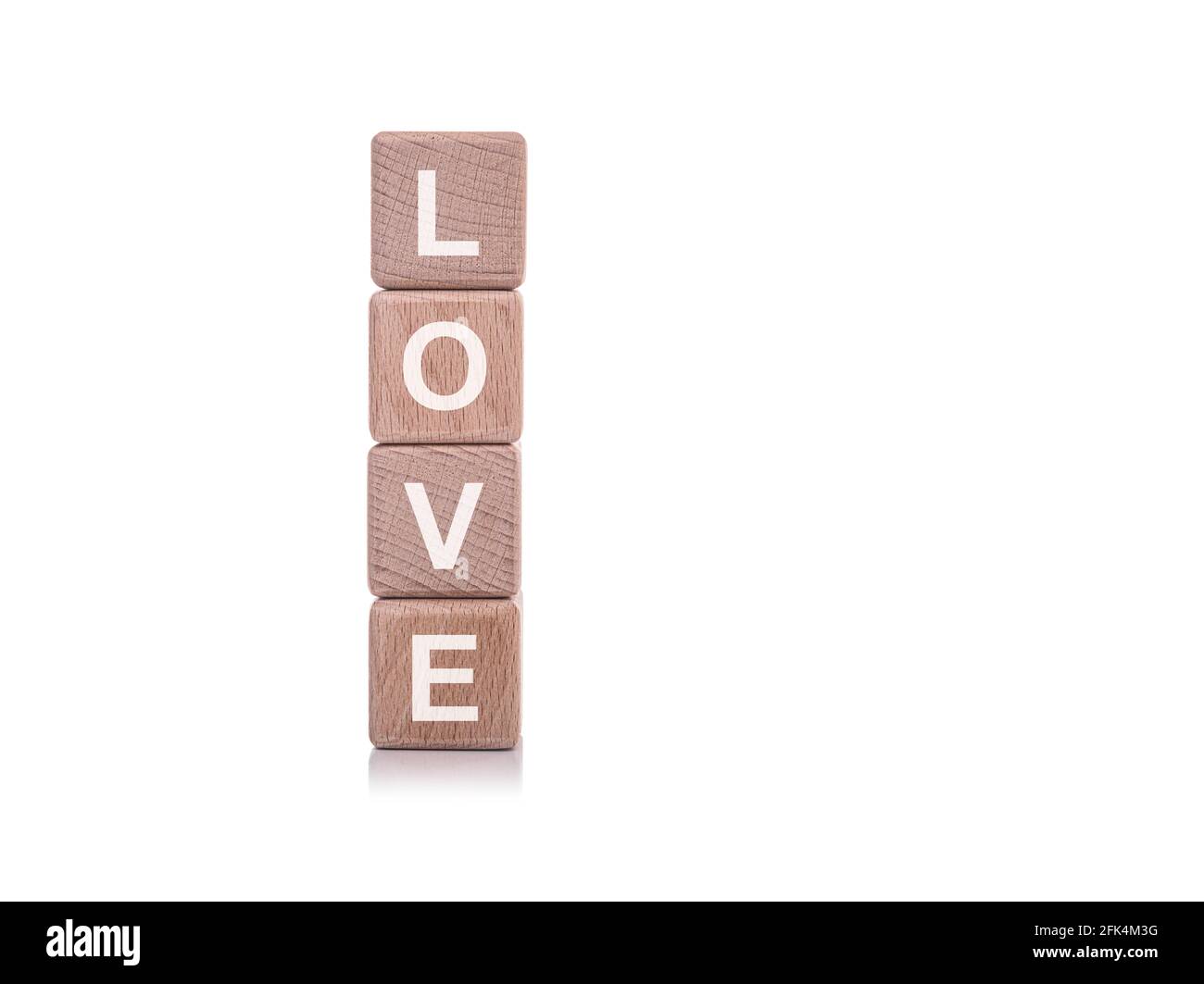 Love. Wooden cubes with the word love on a white background. Stock Photo