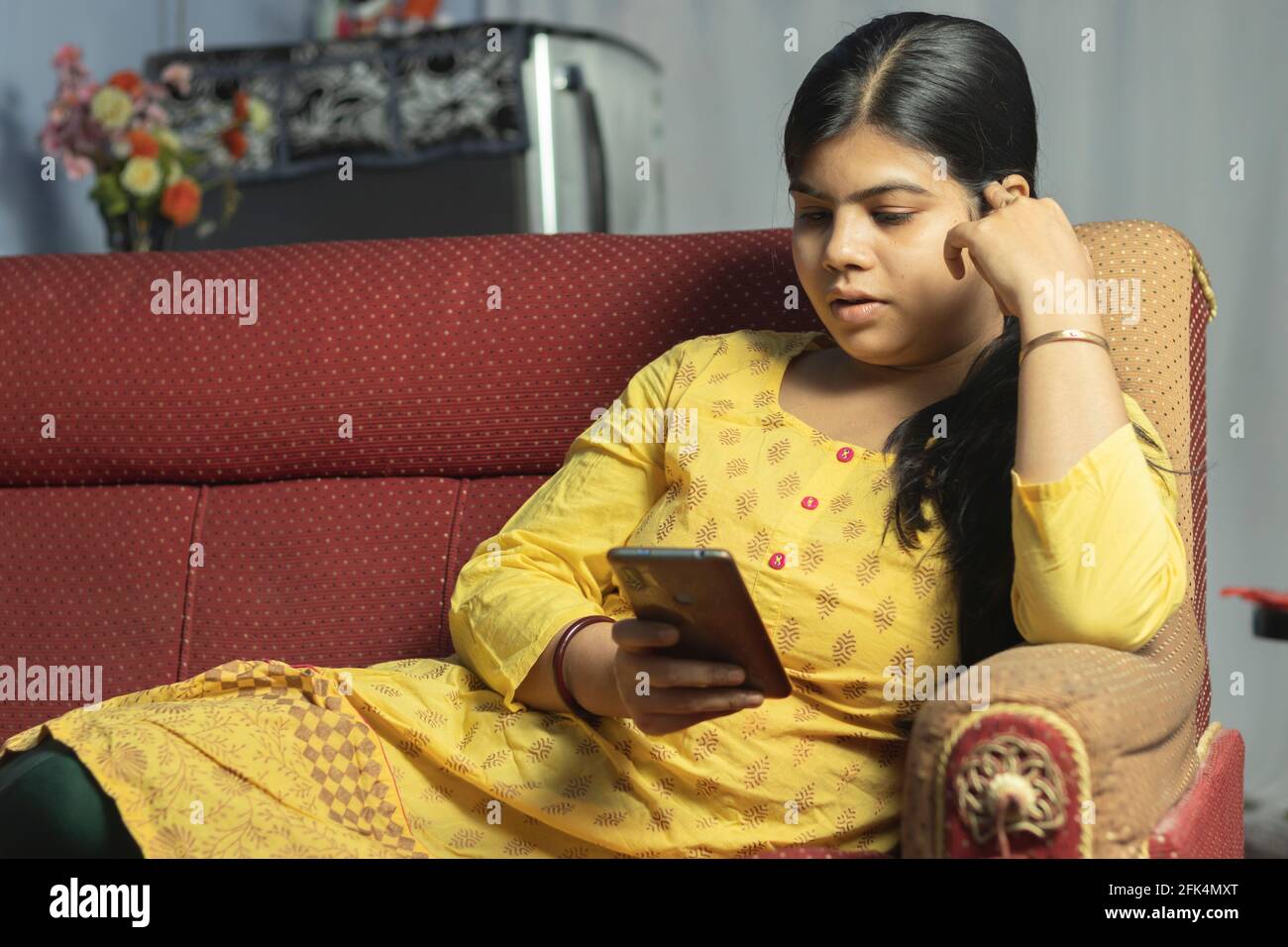 Pretty indian girl sitting on hi-res stock photography and images - Alamy