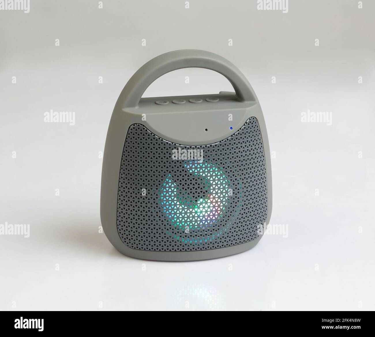 Cute designed speaker with lighting isolated on white background Stock Photo