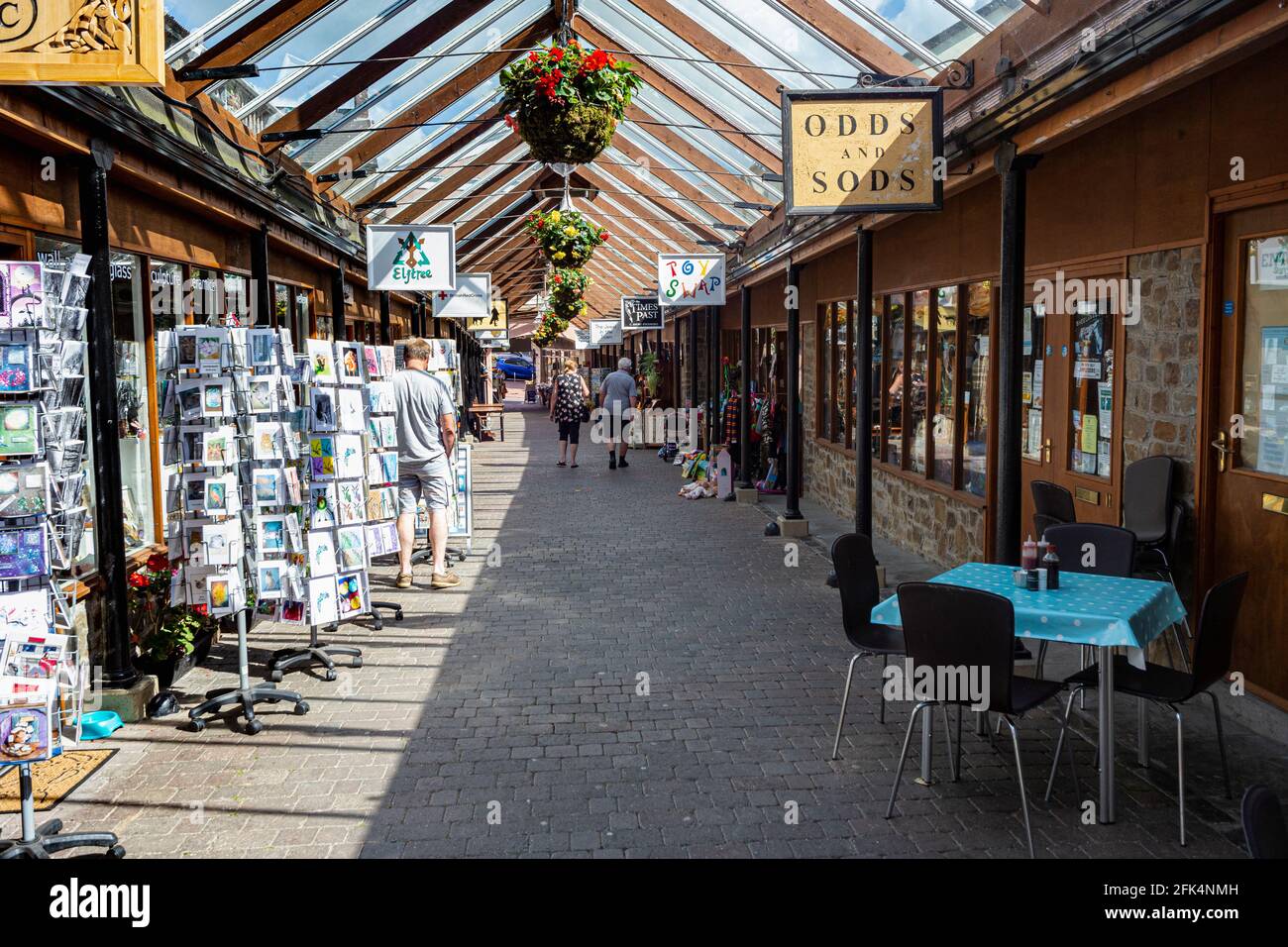 Interior of Great Torrington Pannier Market, Shops and Glass Roof Detail Looking Towards the Main Town Entrance and Torrington Square #3. Stock Photo