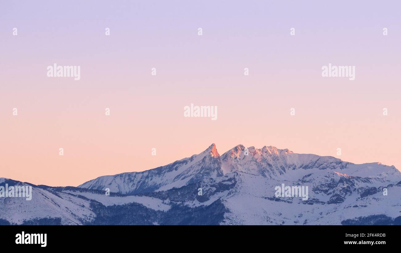 Snowy mountain peak atlantic pyrenees Stock Photo