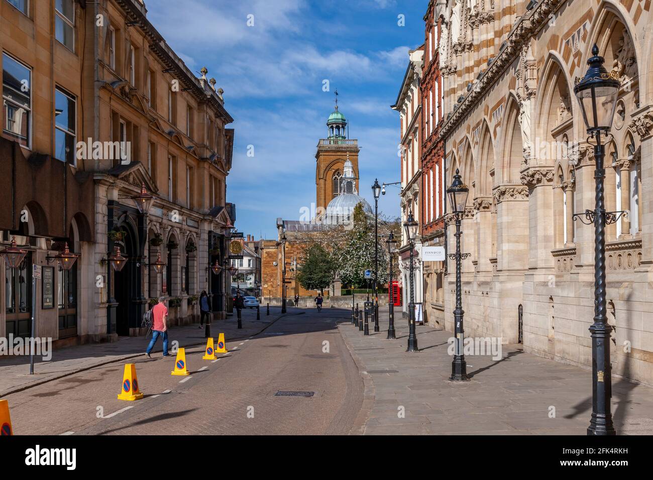 Quiet early morning in Northampton town centre looking towards All Saints Church on a bright sunny morning, Northamptonshire, England, UK. Stock Photo