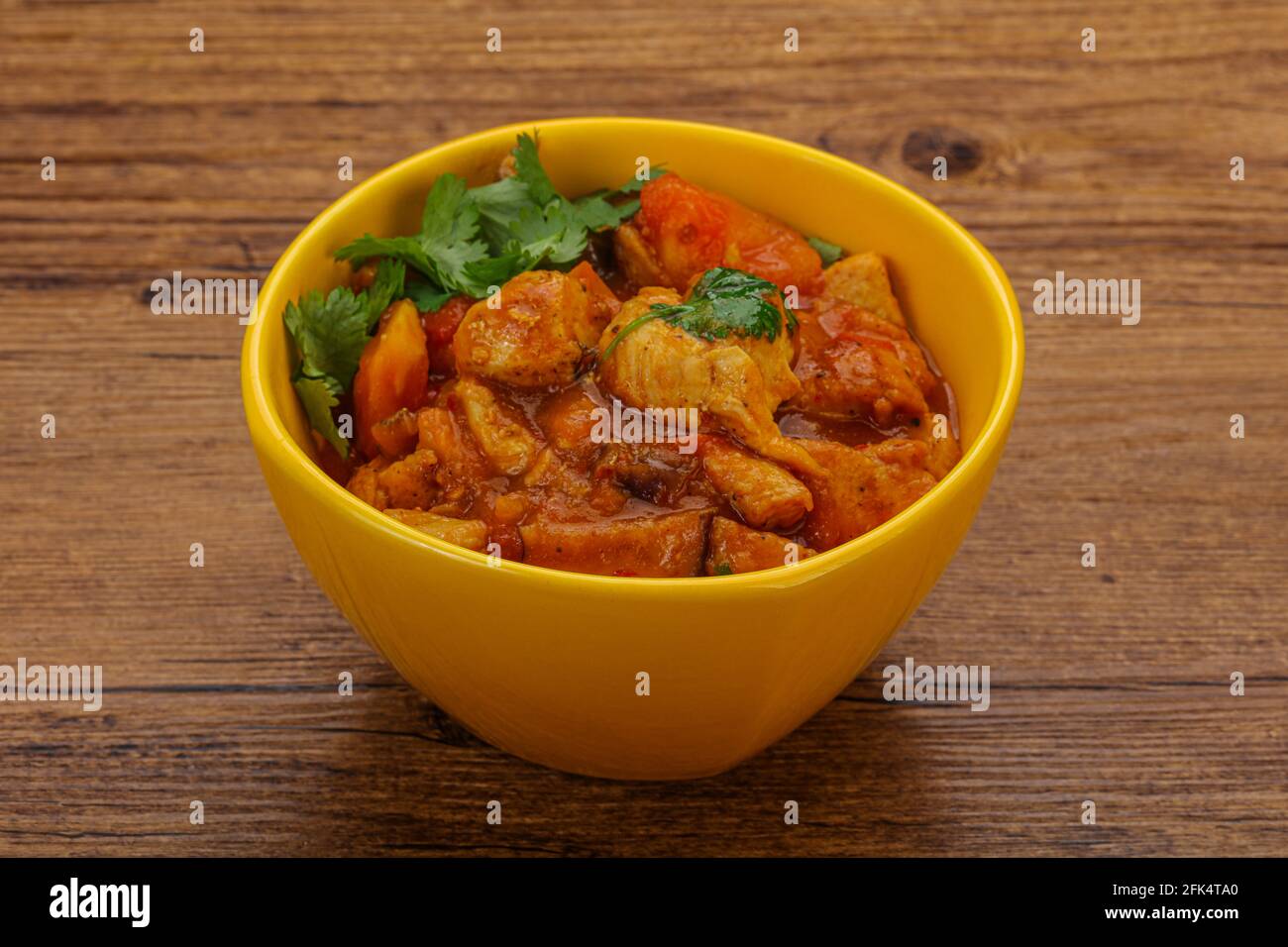 Chicken with oyster sauce and vegetables served cilantro Stock Photo