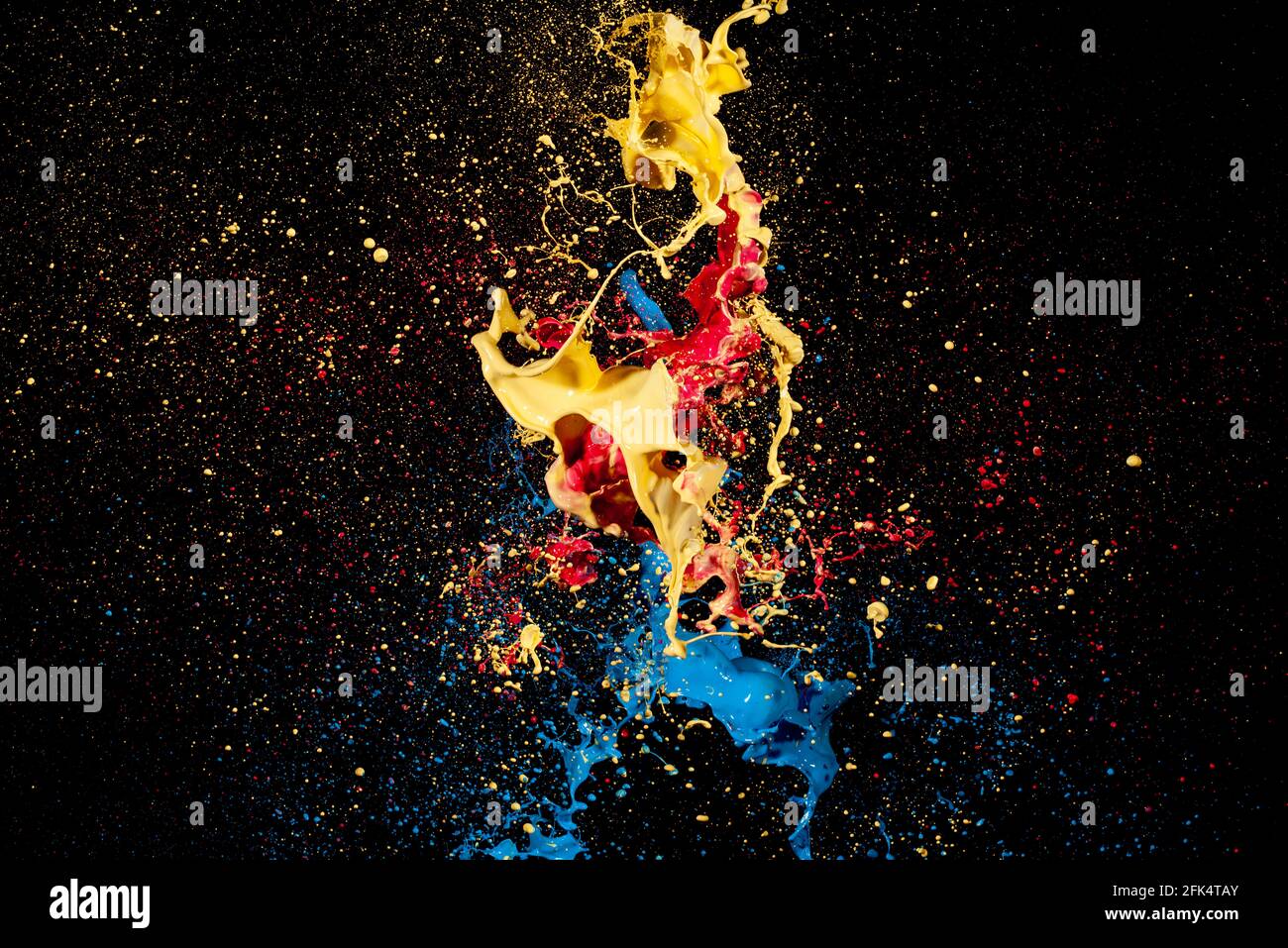 abstract liquid color splash on black background Stock Photo