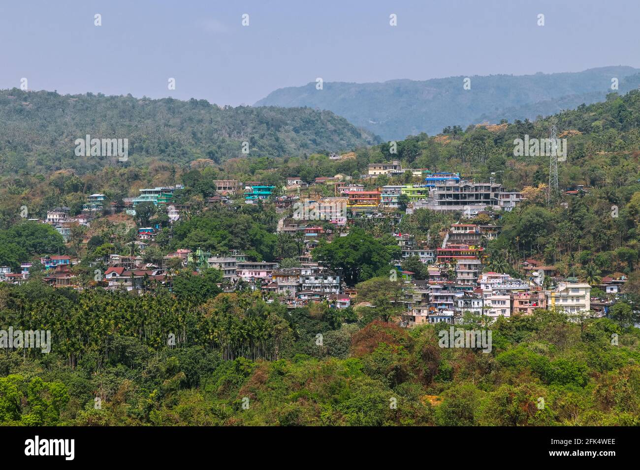 landscape view of a town situated in a hill . Tamabil village India . Stock Photo