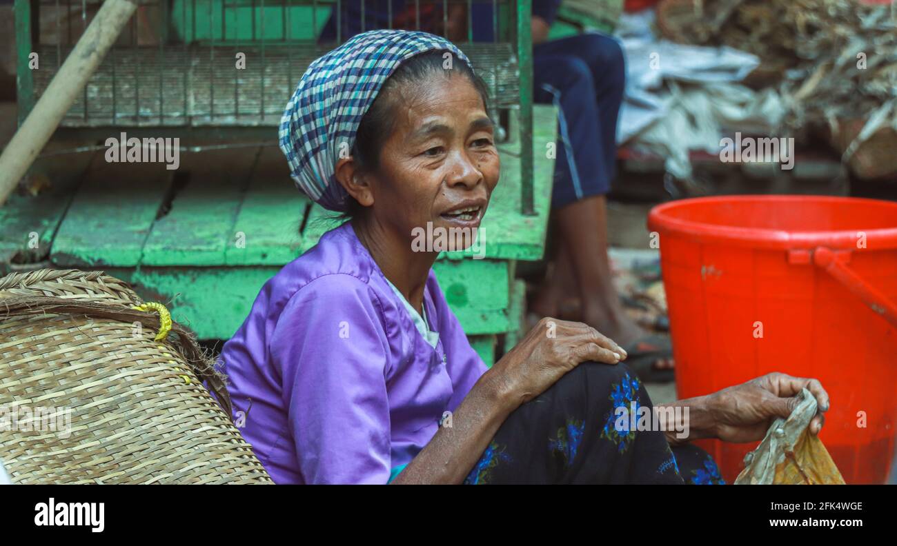 Bandarban , Bangladesh - 1 march 2020 ; working Tribal woman in local market . Stock Photo